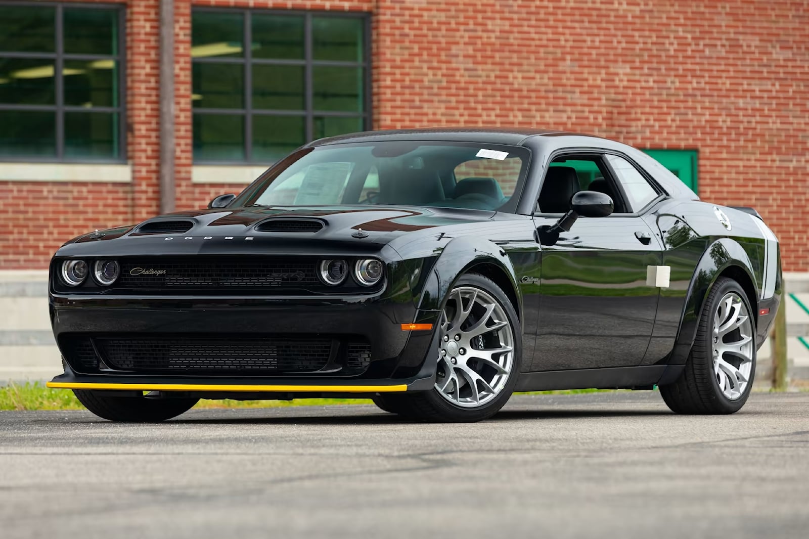 The Iconic "Black Ghost" Dodge Challenger And Its Modern Successor Are