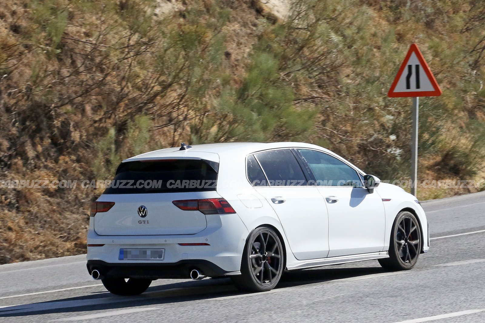 2024 Volkswagen Golf facelift spied with new look, super-sized screen -  Drive