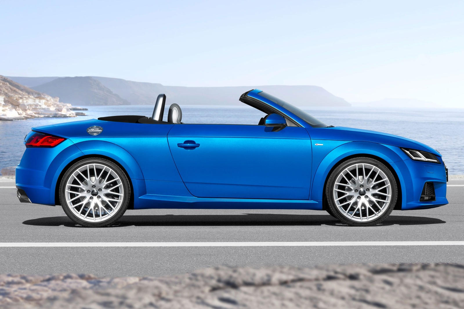 https://cdn.carbuzz.com/gallery-images/2023-audi-tt-roadster-right-side-view-carbuzz-337457-1600.jpg