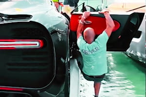 Hanging Off The Side Of A Bugatti Chiron Looks Like A Bad Idea