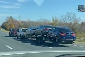 Watch A Crazy Ford F-Series Driver Tow A Truck Hauling A Trailer Loaded With Cars