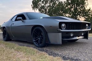 Dodge Challenger Wearing 1969 Chevrolet Camaro Body Kit Is A Confusing Mess