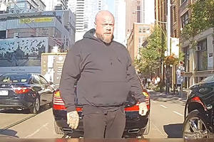 Watch Drake's Security Guard Stop Traffic For His Maybach