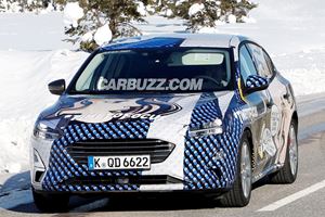 2019 Ford Focus Sedan Spied With Comic Book-Style Camouflage 