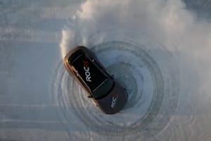 Watch A Porsche Taycan Cross Turismo Spin 69 Donuts On Ice