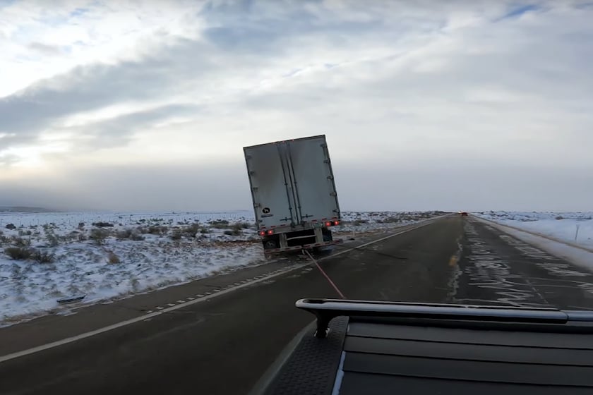 Rivian R1T Recovers 38,000-Pound Semi That Slid Off The Road | CarBuzz