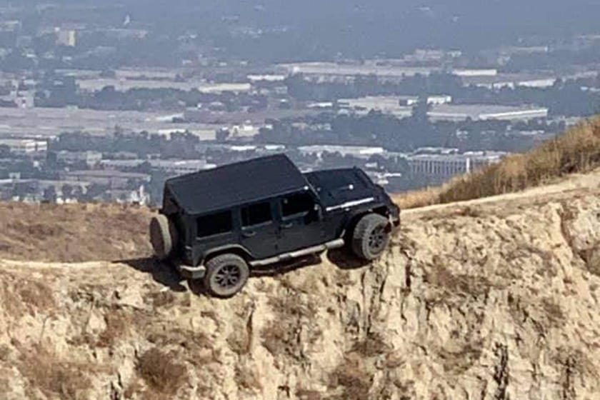 This Jeep Wrangler Got Stuck At The Top Of A Ridge (But Has Now Been  Rescued) | CarBuzz